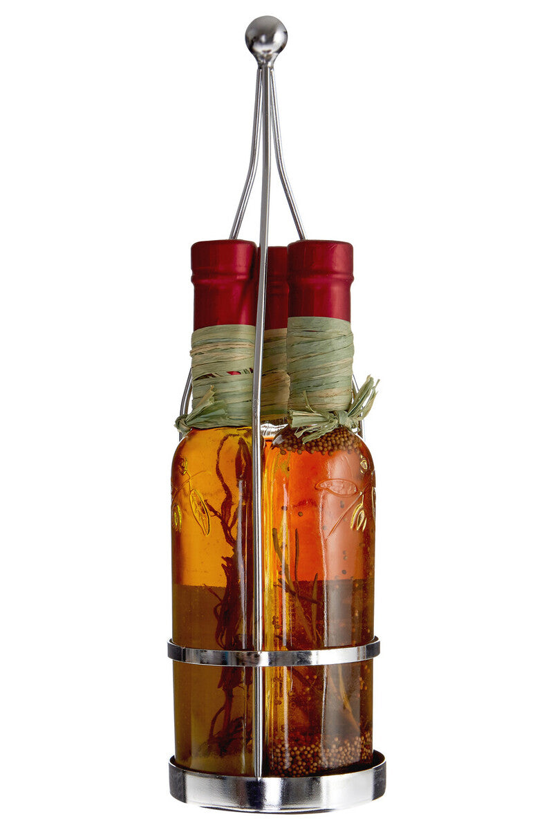 Bottle of olive oil and vinegar with a metal holder on a white background