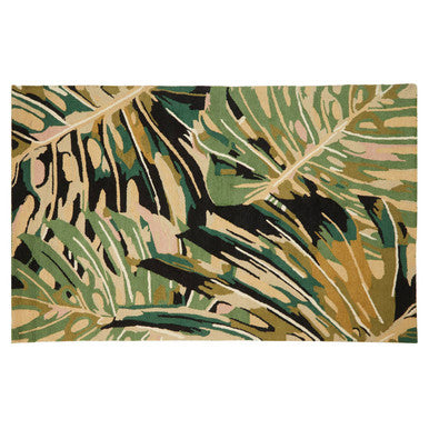 Tropical leaf patterned rug with green, brown, and beige colors on a white background