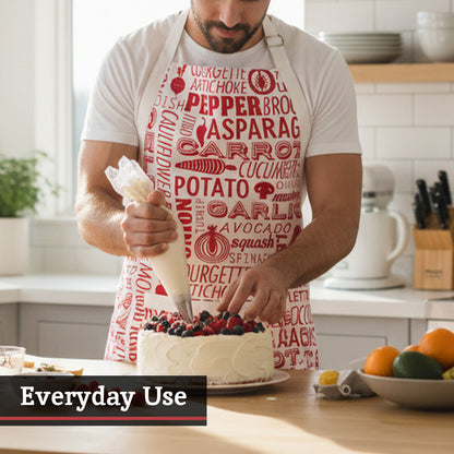 Person in a kitchen wearing a colorful apron, preparing a cake with berries.