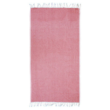 Pink rug with white fringe on a white background