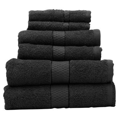 Set of black towels stacked on a white background