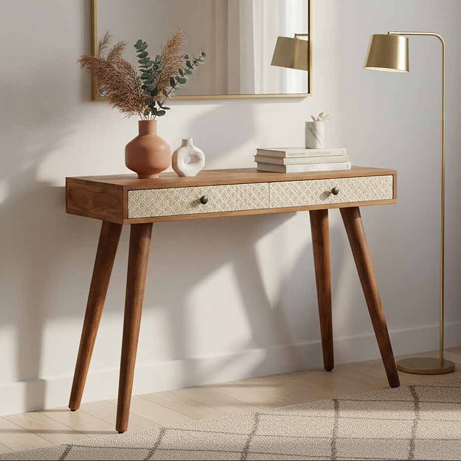 Wooden console table with mirror, lamp, and decor in a room setting.