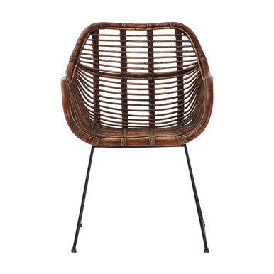 Wicker chair with metal legs on a white background
