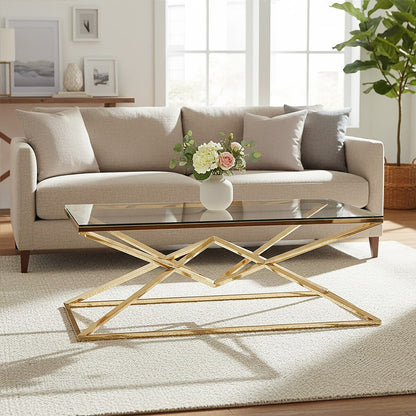 Living room with a beige sofa, gold coffee table, and floral arrangement.