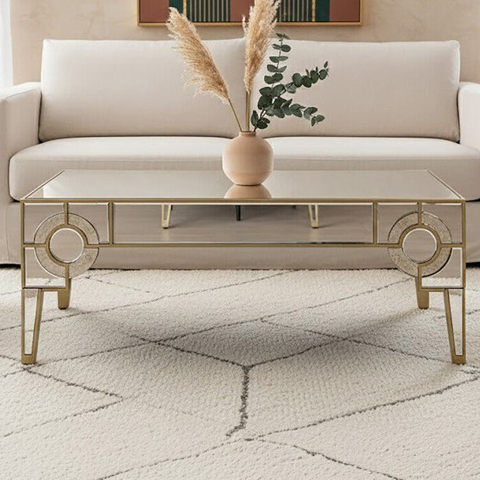 Modern living room with a beige sofa, gray armchairs, and a decorative coffee table.