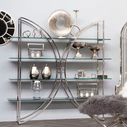 Modern interior design with a glass shelf, decorative items, and a chair with a pillow.