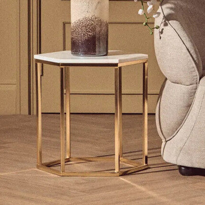 Modern beige armchair in a room with wooden flooring and panelled walls.