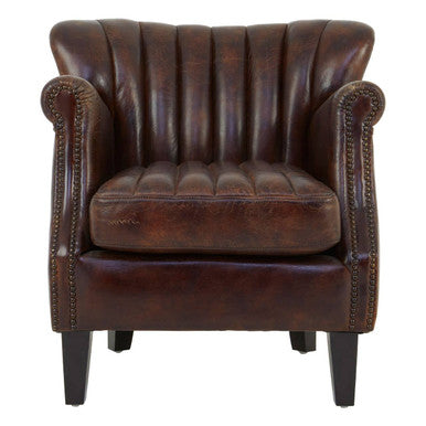 Brown leather armchair with nailhead trim on a white background