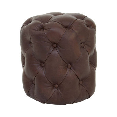 Brown tufted ottoman on a white background