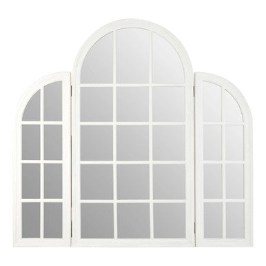 White arch-shaped window frame with glass panes on a white background