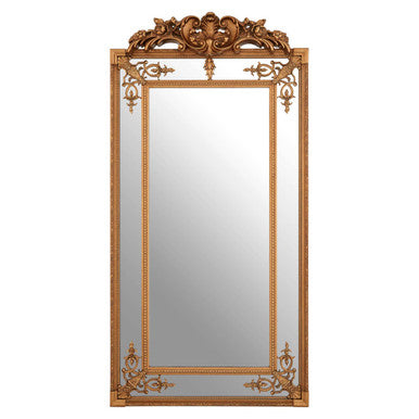 Decorative gold-framed mirror on a white background