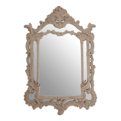 Decorative wall mirror with intricate frame on a white background