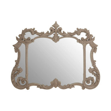 Decorative mirror with intricate frame on a white background