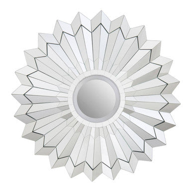 Decorative wall mirror with a sunburst design on a white background