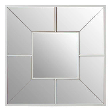 Decorative mirror with geometric frame on a white background