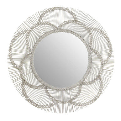 Round mirror with a decorative metal frame on a white background
