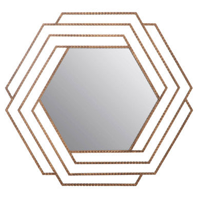 Hexagonal mirror with decorative frame on a white background