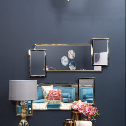 Modern interior with a console table, chair, and decorative elements against a dark blue wall.