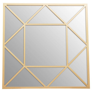 Decorative wall mirror with geometric gold frame on a white background
