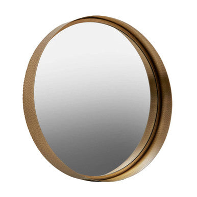 Round mirror with a gold frame on a white background