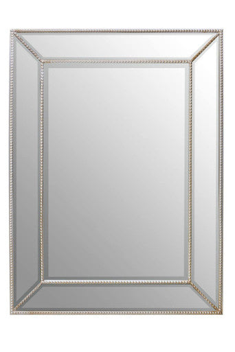Rectangular mirror with a decorative gold frame on a white background