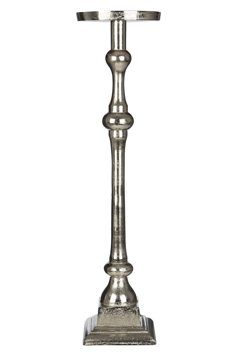 Decorative metal candle holder on a white background