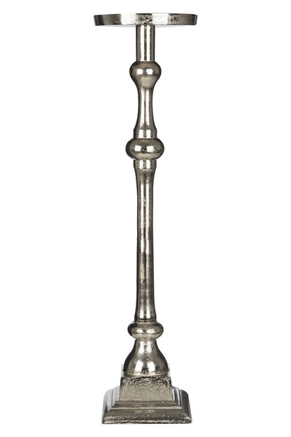 Decorative metal candle holder on a white background