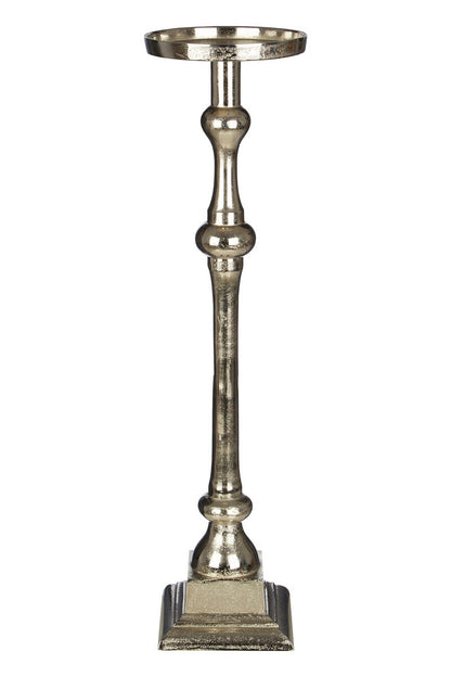 Decorative metallic candle holder on a white background