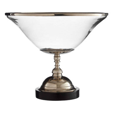 Decorative glass bowl with metallic base on a white background