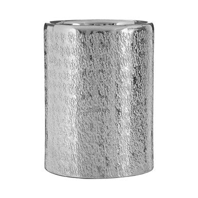 Silver textured candle holder on a white background