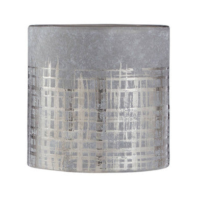 Decorative wall sconce with textured design on a white background