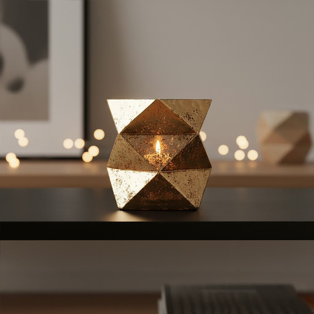 Decorative geometric candle holder on a table with blurred background