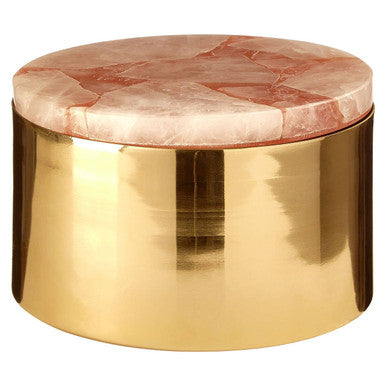 Round coffee table with pink marble top and gold base on a white background