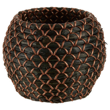 Woven brown basket on a white background