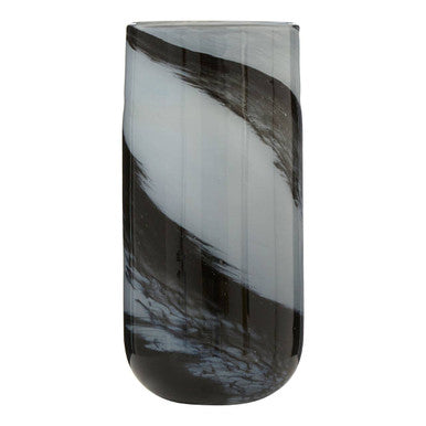 Tall glass vase with black and white swirl pattern on a white background