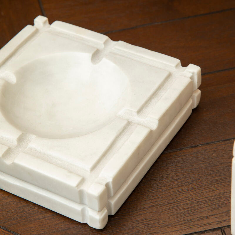 White ceramic dish on a wooden surface