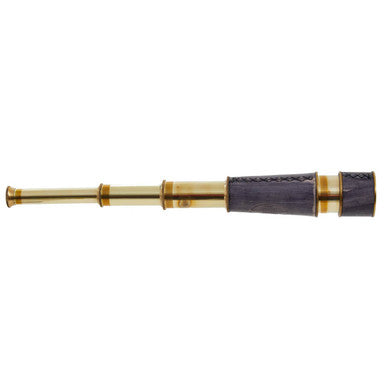 Brass telescope with wooden handle on a white background