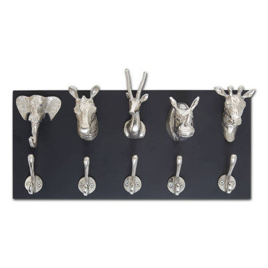 Decorative wall hook set with animal head designs on a black background
