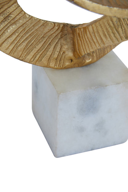 Evra Gold Sculpture On White Marble Base