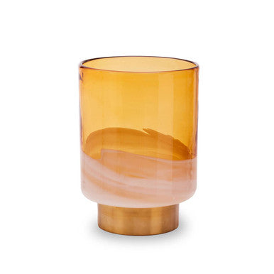 Amber glass vase with bronze base on a white background