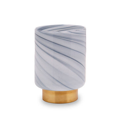 Marble-patterned vase with gold base on a white background