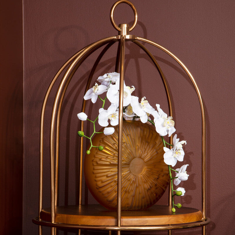 Decorative birdcage with a wooden ball and white flowers on a brown background
