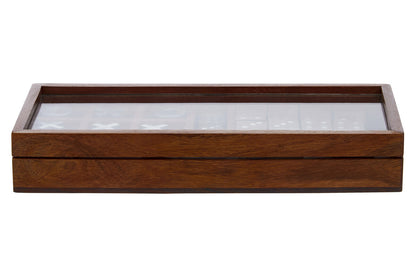 Wooden jewelry box with glass lid on a white background