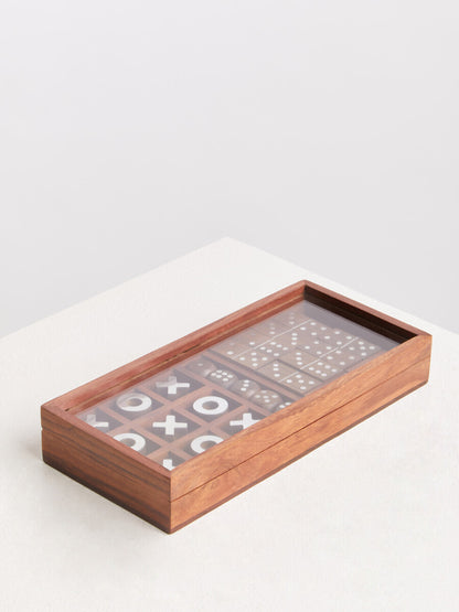 Wooden game box with transparent lid on a white background