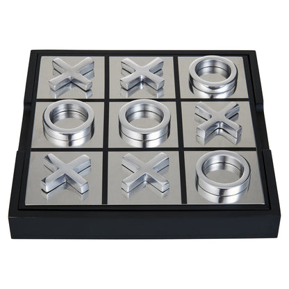 Noughts and crosses game set with metallic pieces on a white background