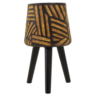 Small stool with a black and gold patterned seat on a white background