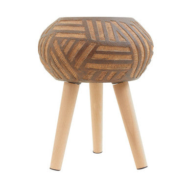 Hexagonal woven stool with wooden legs on a white background