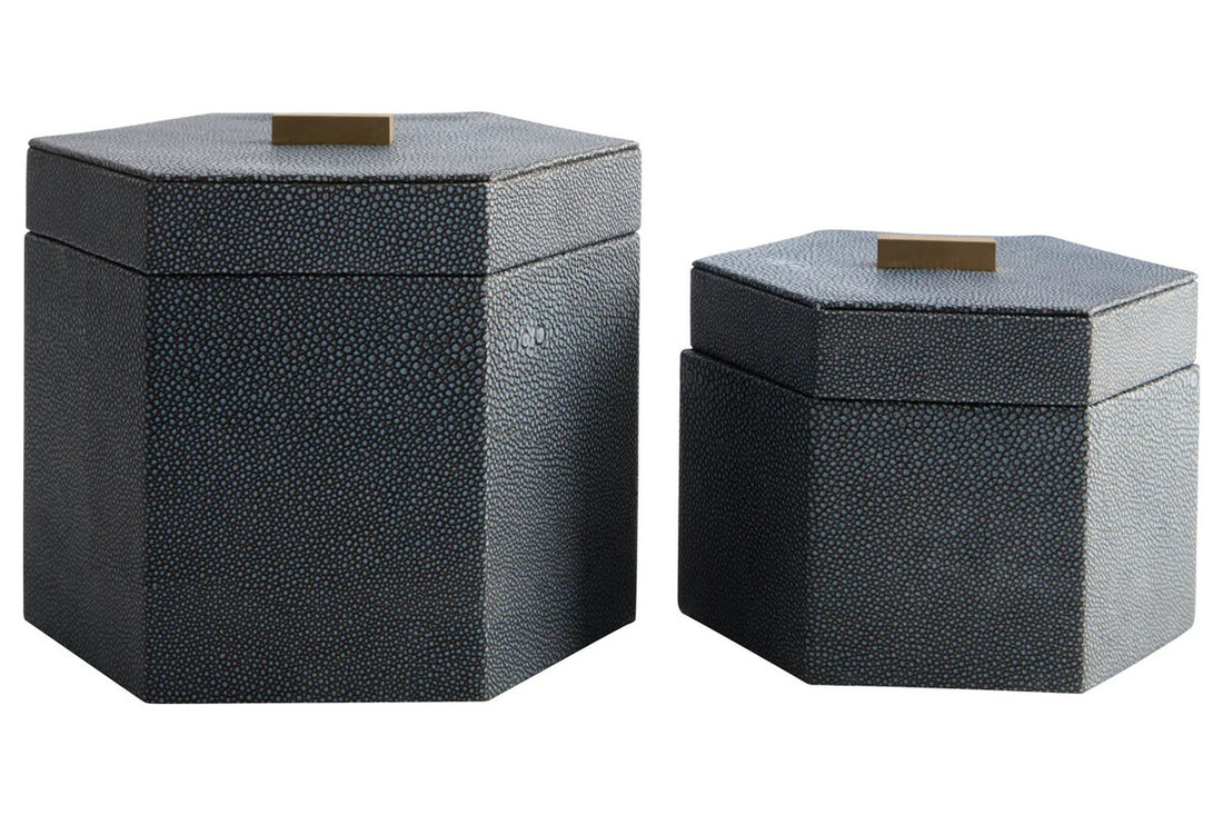 Two hexagonal black textured boxes on a white background