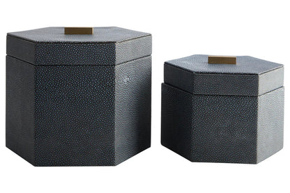 Two hexagonal black textured boxes on a white background