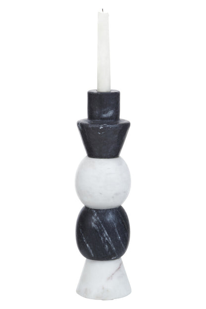 Candle holder with marble-like design on a white background